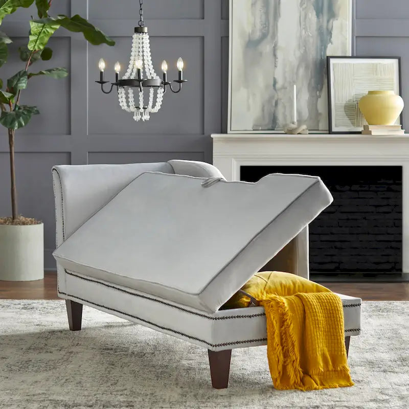 Chaise longue contenitore con bordino a borchie